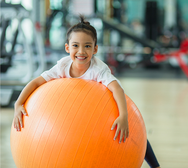 asian-child-girl-with-gymnastic-ball-2025-02-12-18-33-06-utc 1